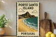 A vintage-style metal sign displaying the text "PORTO SANTO ISLAND" and "PORTUGAL" with a beach and mountain illustration, placed on a wooden surface next to a potted plant and a cutting board.