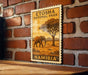 A wooden surface with a vintage-style stamp featuring an elephant and the text "ETOSHA NATIONAL PARK NAMIBIA" displayed on a brick wall.