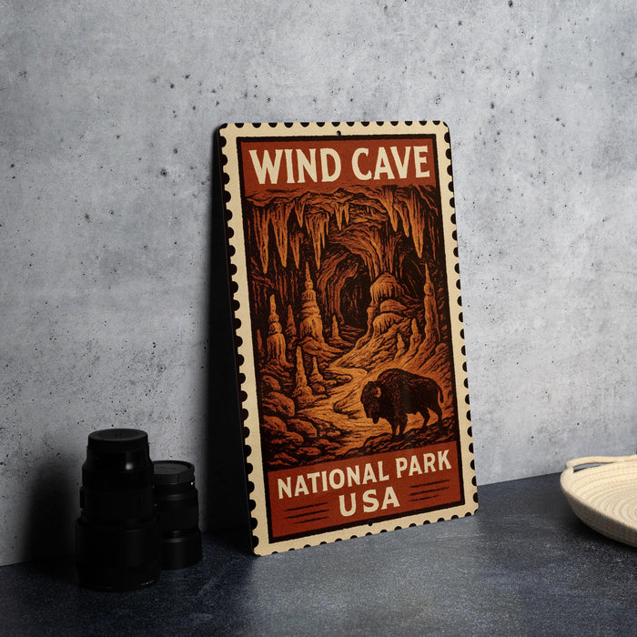 A framed poster of the Wind Cave National Park in the United States, featuring an illustration of the cave and a bison.