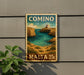 a vintage-style metal sign with a coastal scene, mounted on a wall.