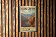 A vintage-style postage stamp depicting the Grand Canyon, with the text "GRAND CANYON NATIONAL PARK USA" printed on it.