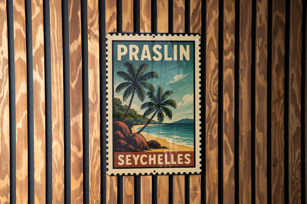 A vintage-style postage stamp featuring a tropical beach scene with palm trees and a rocky shoreline, hanging on a wooden wall.
