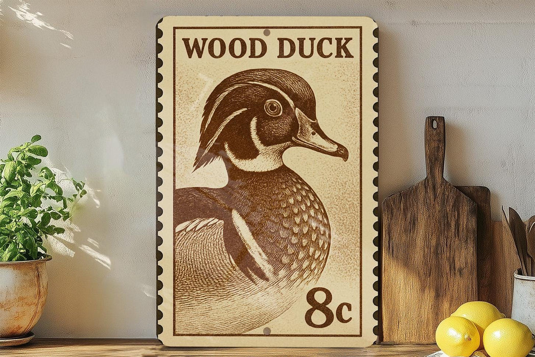 a wooden duck stamp with the text "WOOD DUCK 8c" on it, placed on a wooden surface next to a potted plant and a wooden cutting board.