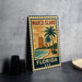 A vintage-style metal sign with a tropical beach scene and palm trees, featuring the text "MARCO ISLAND FLORIDA USA" on it.