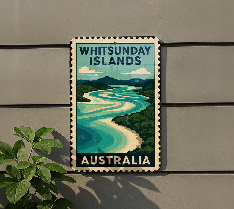 A vintage-style sign for Whitsunday Islands, Australia, featuring a scenic illustration of a river and lush greenery.