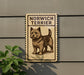 a sign for a Norwich Terrier, with a picture of the dog on it.