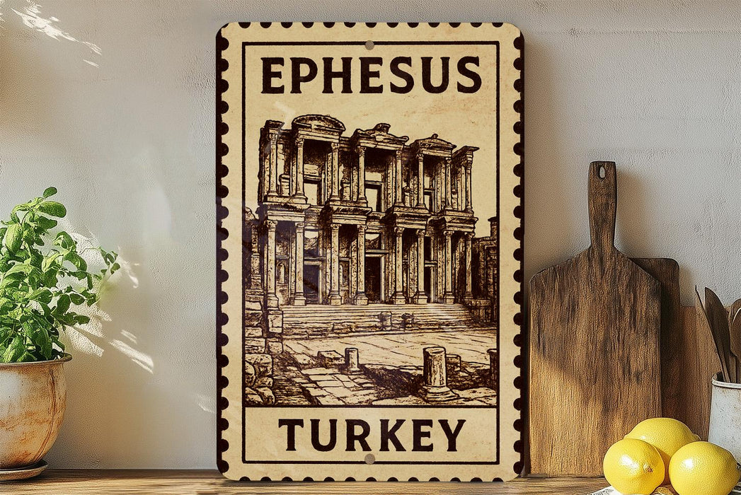 A framed illustration of the Library of Ephesus, a famous ancient Greek Library located in Turkey, is displayed on a wall.