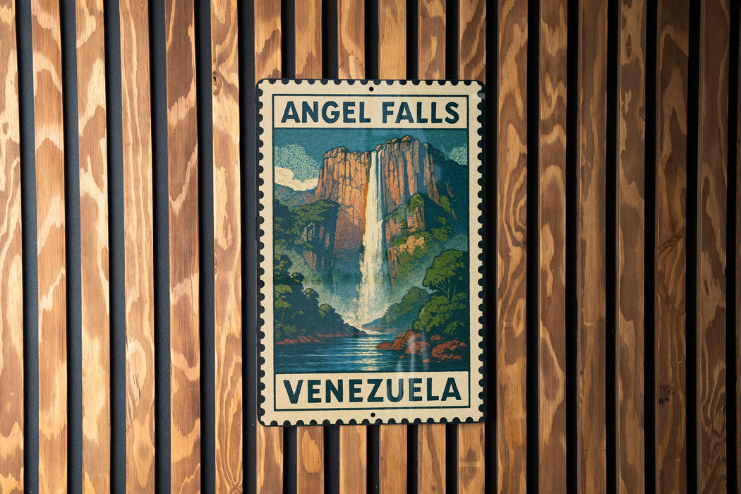 A vintage-style metal sign with the text "ANGEL FALLS VENEZUELA" and a painting of a waterfall, mounted on a wooden wall.