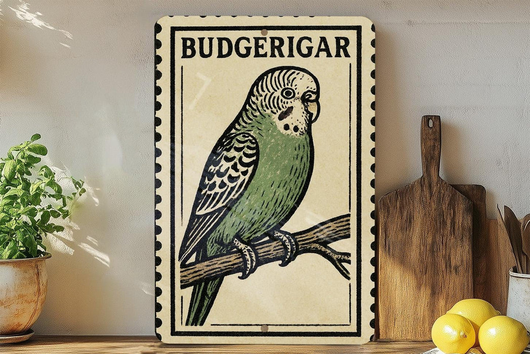 A vintage-style metal sign featuring a detailed illustration of a Budgerigar, a small parakeet, perched on a branch. The sign is framed with a decorative border and is displayed on a wooden shelf, accompanied by a potted plant and a wooden cutting board.