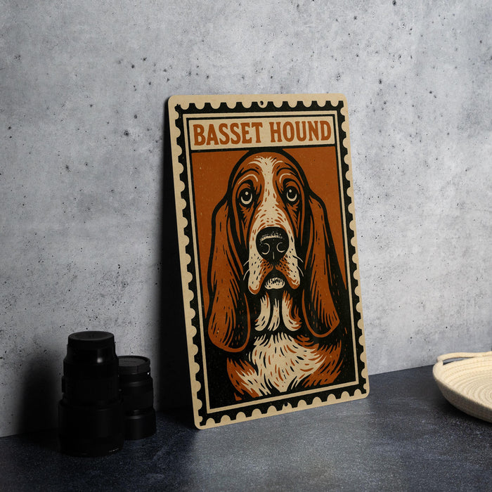 A metal sign featuring a basset hound illustration is displayed on a table.
