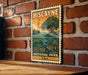 A vintage-style stamp or sign for Biscayne National Park, featuring a tropical landscape with a turtle, palm tree, and other wildlife.