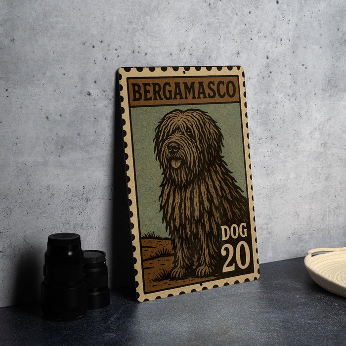 A metal sign featuring a large illustration of a shaggy dog, with the text "BERGAMASCO" and "DOG 20" printed on it.