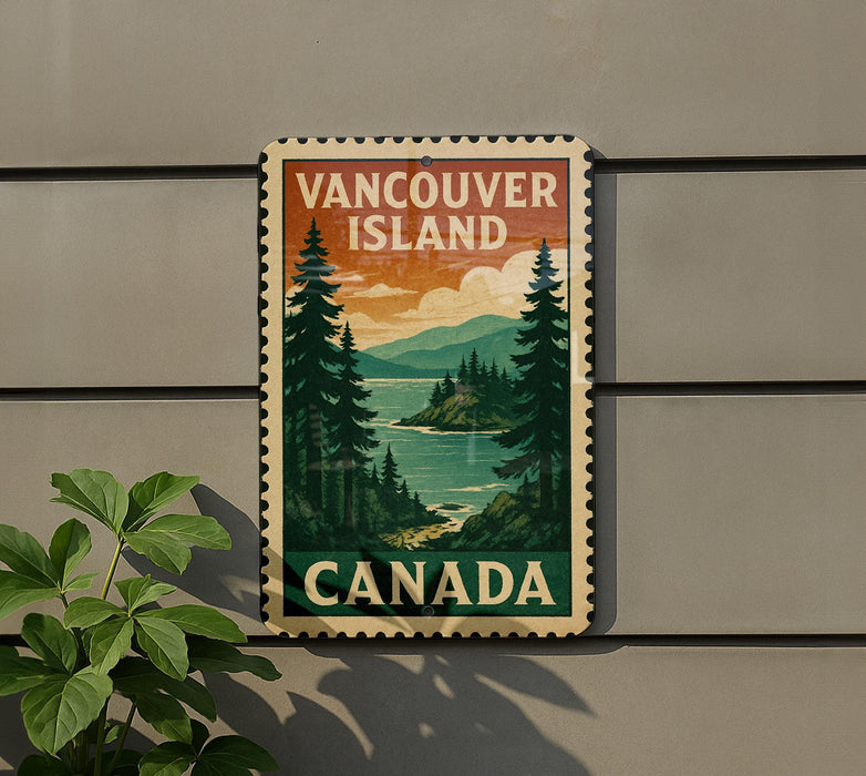 A vintage-style metal sign with the text "VANCOUVER ISLAND CANADA" is displayed on a wall, with a plant to the left of the sign.