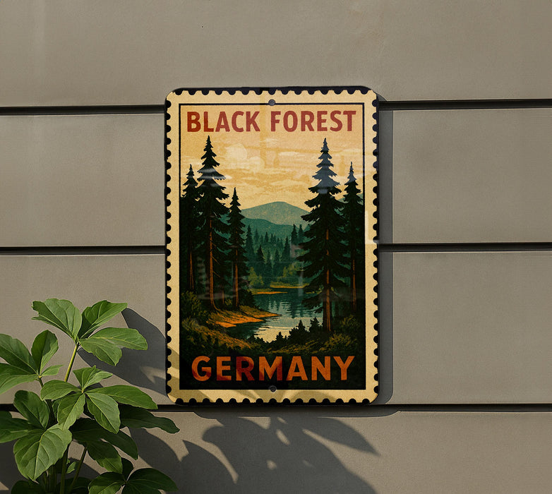 A vintage-style postage stamp depicting a forest scene with pine trees and a river, mounted on a wall.