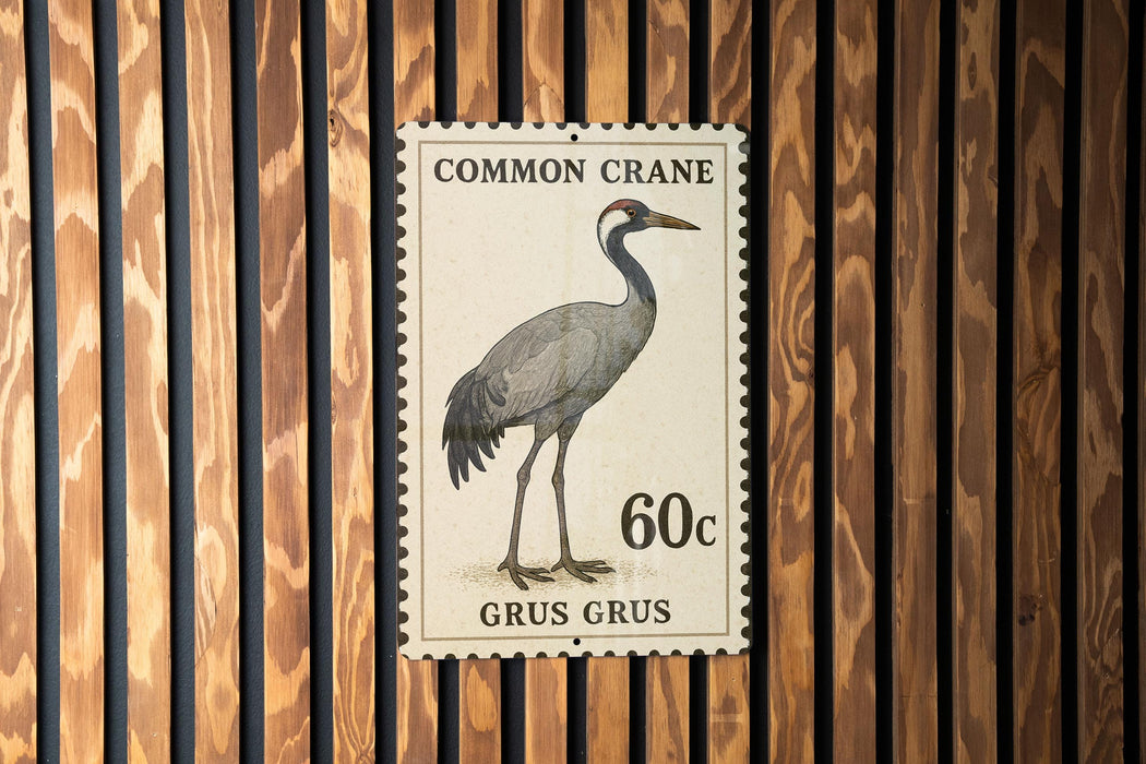A postage stamp featuring a Common Crane, with the text "Common Crane" and "60c" printed on it.