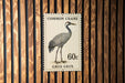 A postage stamp featuring a Common Crane, with the text "Common Crane" and "60c" printed on it.