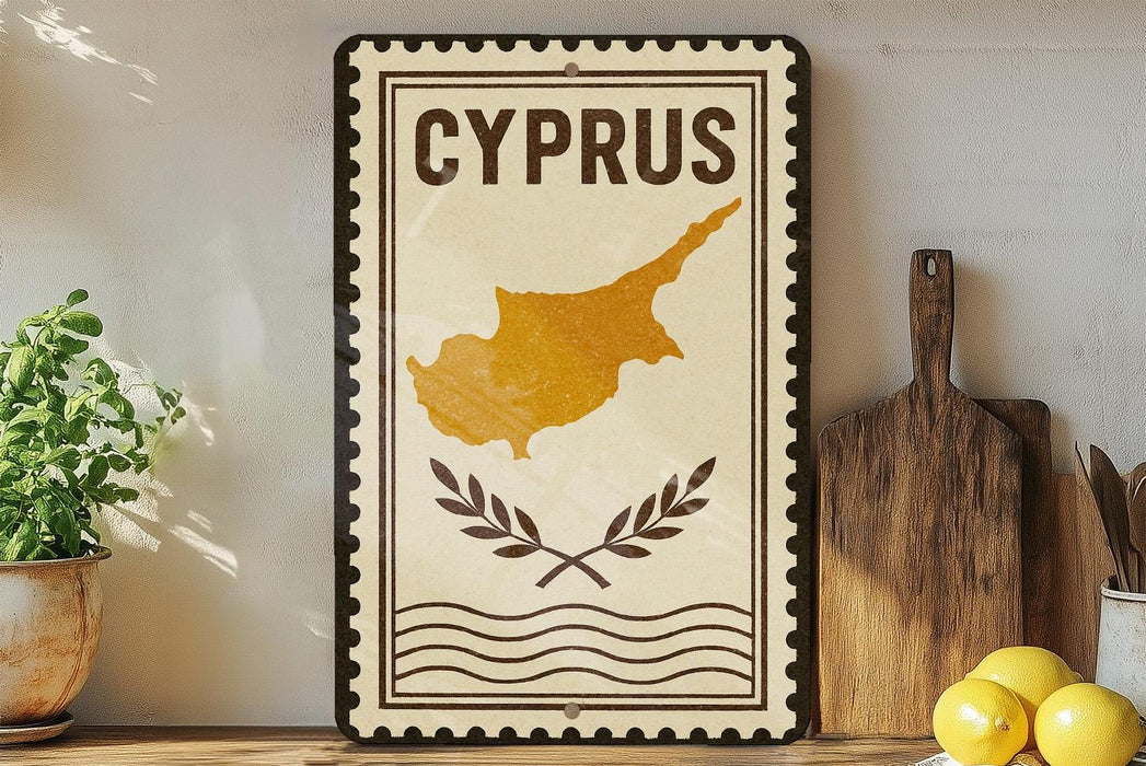 a decorative sign with the word "CYPRUS" on it, along with a map of the island of Cyprus. The sign is placed on a shelf next to a wooden cutting board and some potted plants.