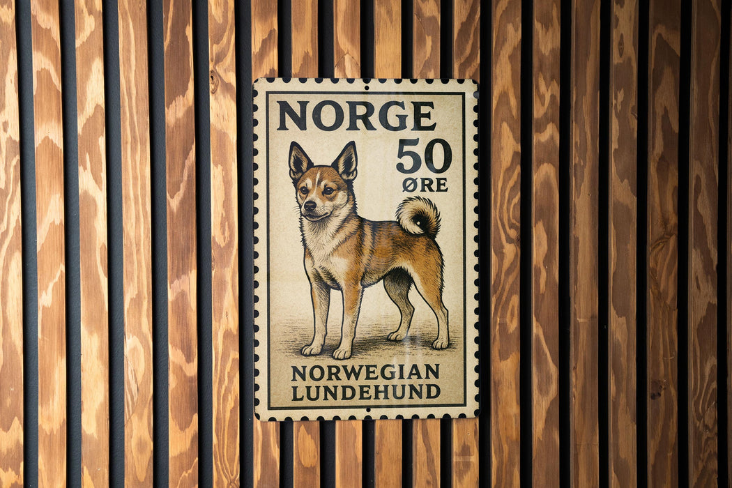 A postage stamp featuring a dog, specifically a Norwegian Lundehund, is displayed on a wooden wall.