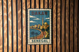 A vintage postage stamp depicting Dakar, Senegal, with a cityscape and palm trees.