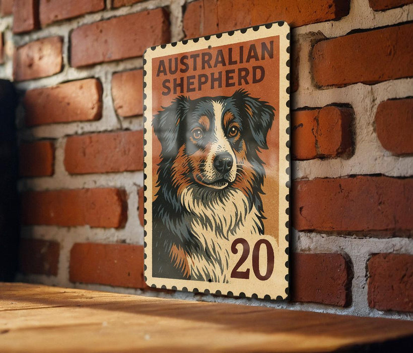 a wooden table with a framed Australian Shepherd dog stamp on the wall.