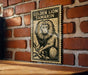 A wooden table with a large, ornate stamp featuring a lion's face on it, mounted on a brick wall.