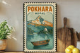 A vintage-style metal sign with a mountain landscape and a boat, mounted on a wall next to a wooden cutting board and some potted plants.