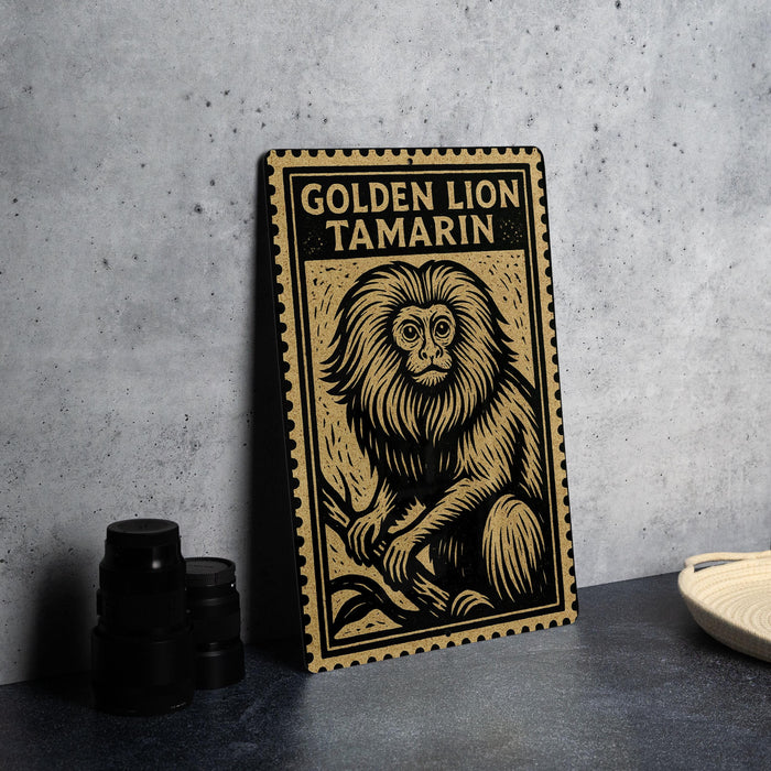 A framed illustration of a golden lion tamarin, a type of primate, is displayed on a table.