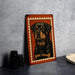 a framed illustration of a dog, specifically a Rottweiler, on a wall.
