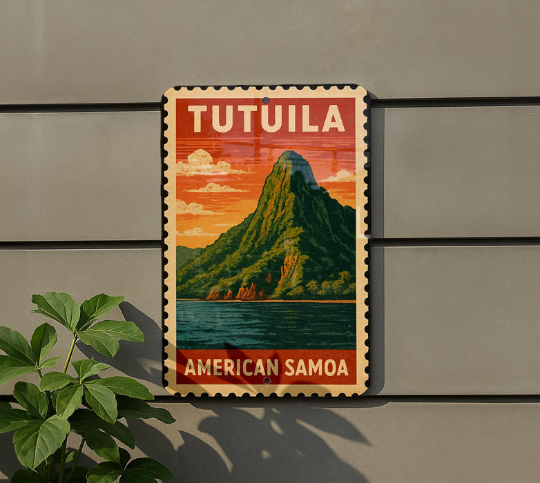 A vintage-style sign for Tutuila, an island in American Samoa, featuring a mountain landscape with a body of water in the background.