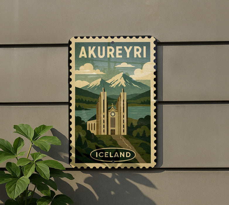 A vintage-style sign for Akureyri, Iceland, featuring a castle and mountains in the background.