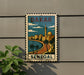 A vintage postage stamp depicting Dakar, Senegal, with a cityscape and palm trees.