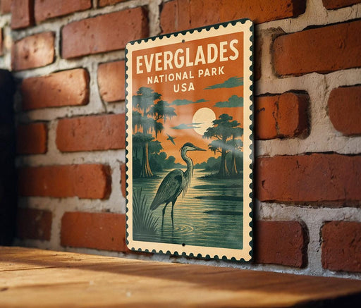 A vintage-style postage stamp featuring a seagull and a landscape with a body of water, mounted on a brick wall.
