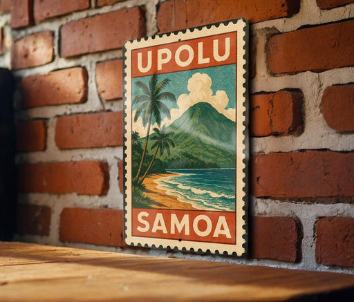 A vintage-style postage stamp depicting a tropical beach scene with palm trees and a mountain in the background, hanging on a brick wall.