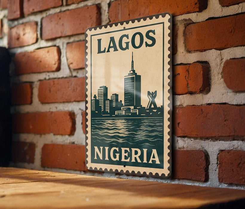 A vintage-style metal sign with the text "LAGOS NIGERIA" displayed on a brick wall.