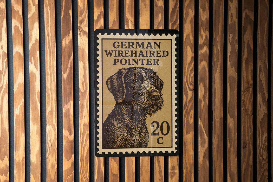 A German Wirehaired Pointer dog is depicted on a postage stamp, which is affixed to a wooden wall.