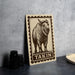 a metal sign with a printed illustration of a yak, and the word "Takin" written below it.