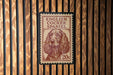 A red and white stamp featuring an illustration of a cocker spaniel dog, with the text "ENGLISH COCKER SPANIEL" printed on it.