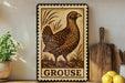 a wooden sign with a bird illustration, placed on a shelf next to a wooden cutting board and some lemons.