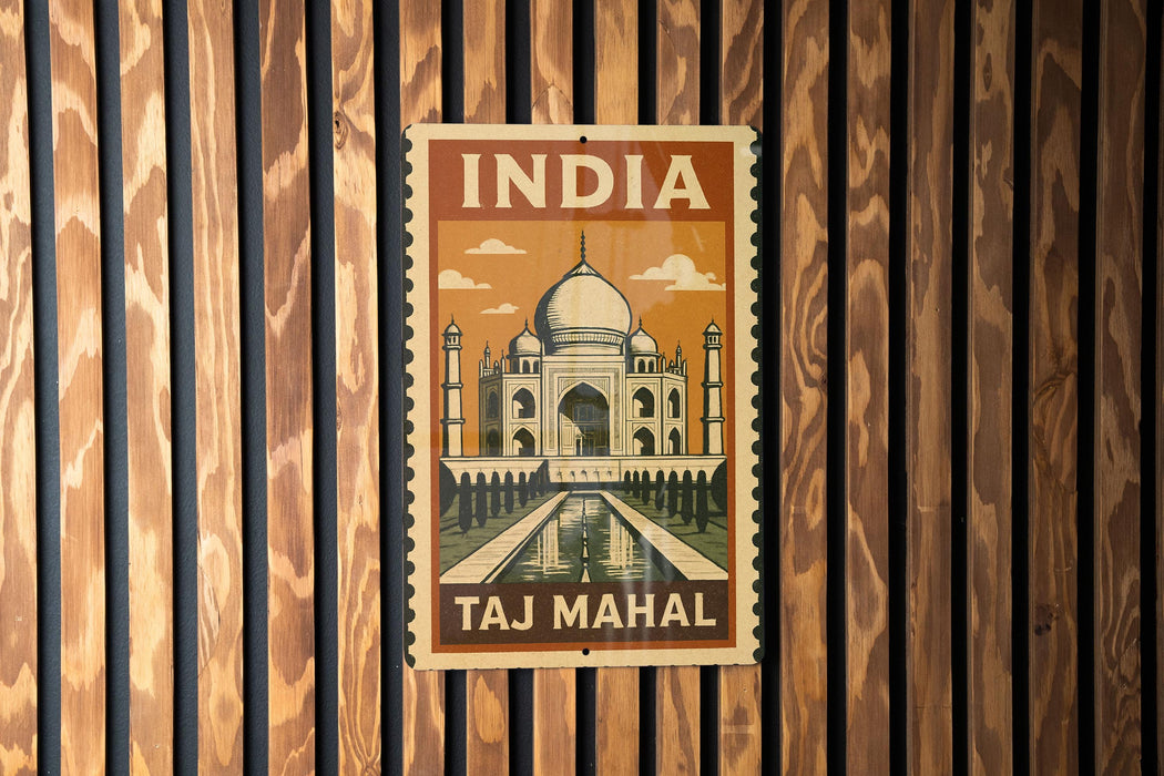 A vintage-style poster of the Taj Mahal, a famous mausoleum in India, is displayed on a wooden wall.