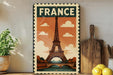 a vintage-style poster of the Eiffel Tower, a famous landmark in Paris, France, displayed on a wall.