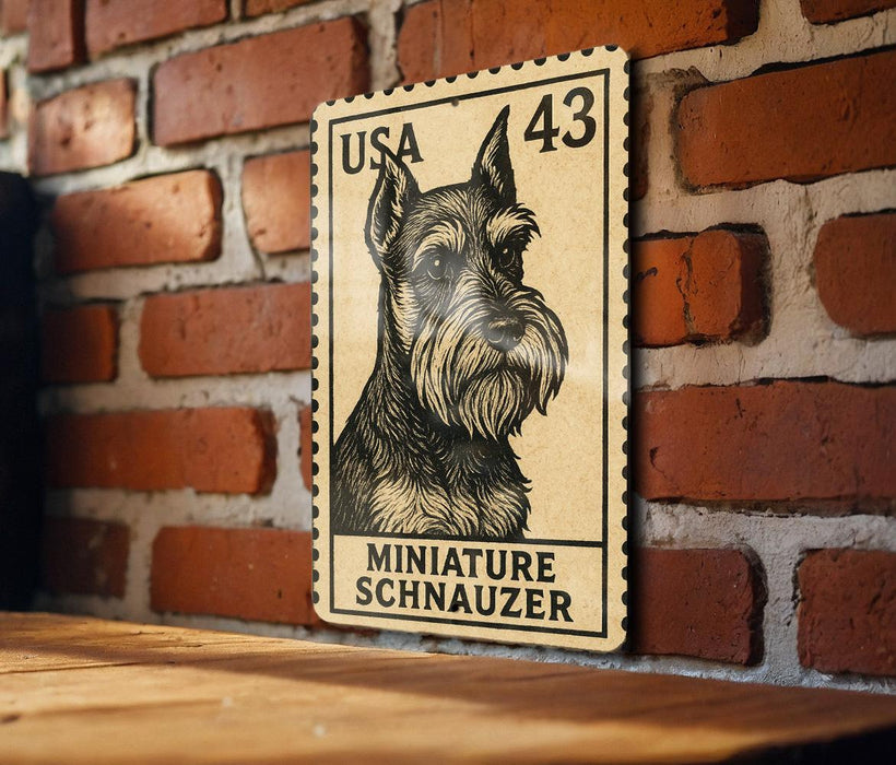 A miniature schnauzer dog is depicted on a US postage stamp, which is mounted on a brick wall.