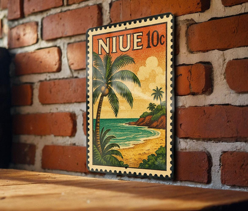 A vintage postage stamp featuring a tropical beach scene with palm trees and a sunset over the ocean.