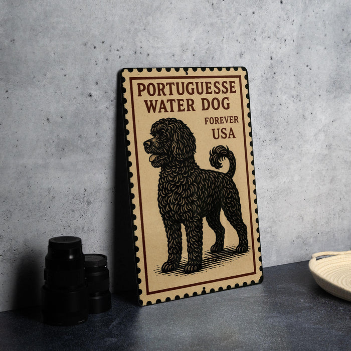 A metal sign with a black and brown illustration of a poodle, along with text that reads "PORTUGUESE WATER DOG FOREVER USA".