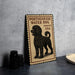 A metal sign with a black and brown illustration of a poodle, along with text that reads "PORTUGUESE WATER DOG FOREVER USA".