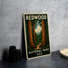 A vintage-style poster of Redwood National Park in the USA, featuring a scenic illustration of towering redwood trees and a winding path through the forest.