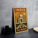 A vintage-style metal sign featuring the Taj Mahal, a famous landmark in India, is displayed on a table.
