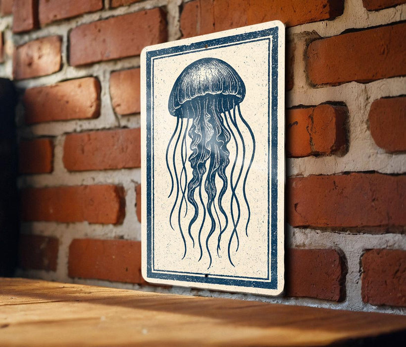 a blue and white sign with a detailed illustration of a jellyfish on a brick wall.