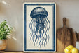 a blue and white sign with a detailed illustration of a jellyfish, placed on a wooden surface next to a wooden cutting board and some lemons.