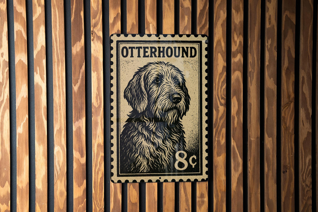 A metal stamp featuring a dog's head is displayed against a wooden background.