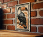 a wooden table with a framed illustration of a toucan perched on a branch.